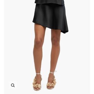 WE WORE WHAT SKIRT NEVER WORN